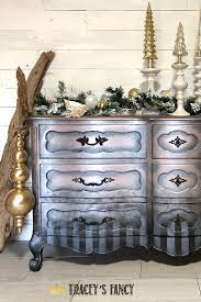 It is a creative way to extend the life of older furniture and update the look of their furniture. Striped Metallic Dresser Whimsical Painted Furniture Metallic Furniture Diy Metallic Painted Furniture