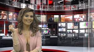 Albanian news anchors go 'topless' to boost audience