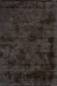 Le tissage plat durable est extrà êmement résistant et correspond avec des tons neutres comme le gris, le marron et beige, et des modèles fantaisistes dans n'importe quelle. Tons Gris Fonce Tisse Main Soie Vegetale 100 Tencel Toulemonde Bochart Tapis Design Et Contemporains Ref 15080099