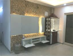 Tv unit interior design tv unit furniture design tv wall design modern interior design interior designing lcd unit design. Tv Unit Cm Pooja Unit With Stone Cladding Tvunitdesignmodern Cladding Pooja Tv Unit Design Modern Ceiling Design Living Room Pooja Room Door Design