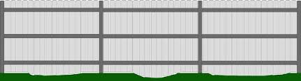 Vertical posts, driven deep into the ground, support the rails. Building A Fence On A Slope
