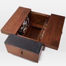 If you think a coffee table with storage is just another table, let me tell you have got the wrong idea. Hyde Hidden Storage Secret Mini Bar Coffee Table
