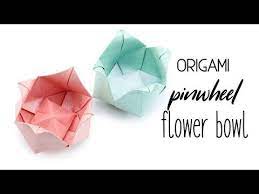 Learn How To Make A Pretty Origami Flower Bowl Or Tulip This Origami Flower Has A Pinwheel Design On The In Origami Paper Flower Tutorial Origami Instructions