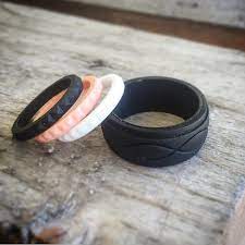 His And Hers Pictured Men S Obsidian Infinity Ring And Women S Stackables In Obsidian White And Peach Silicone Wedding Band Wedding Rings Enso Rings
