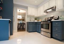 Using a 1 or a 1½ angled brush, first apply paint to the recessed or detailed areas of the cabinet door. Beginner S Guide To Kitchen Cabinet Painting Kitchen Cabinets Painting Kitchen Cabinets Kitchen Cupboards Paint