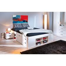 Letto imbottito senza testiera cinnamon, un sommier con giroletto sottile e piedini alti oppure con box contenitore. Letto Una Piazza E Mezza Moderno In Legno Massello Con Vani Cassetti E Comodino