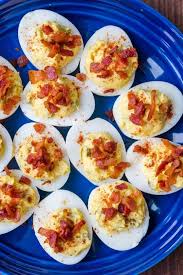 I'm sure you've been eating eggs every day for breakfast though (aren't we all?) so what else can we make with lots of eggs? Best Ever Deviled Eggs With Bacon Natashaskitchen Com