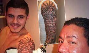 Icardi tattooed the faces of three children on his arm, valentino, constantino, and benedict. Mauro Icardi Gets Tattoo Of Maxi Lopez S Children After Marrying His Ex Wife Wanda Nara Daily Mail Online