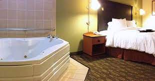 Whirlpool Suite At The Hampton Inn North Seattle Lynnwood Wa Full Review With Video At Http Romantic Hotel Rooms Whirlpool Tub Contemporary Bathroom Rugs