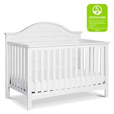 The charming design boasts an arched panel back and slatted front that will grow with your child as it converts to a toddler bed, daybed, and full sized bed. Carter S By Davinci Nolan 4 In 1 Convertible Crib In White Greenguard Gold Certified Shoptwinsandkids Com