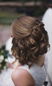 This style gets all the hair off your shoulders, allowing you to show off a unique neckline. Wedding Hairstyles For Short Hair Half Up Half Down Hair Styles Short Wedding Hair Medium Hair Styles