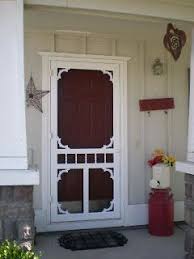 But i have to say, i'm totally smitten with this door, the pale blue paint is all chipped and crackled and old and awesome and the arched panes on top had me at hello. Farmhouse Screen Door We Need One For Our House Diy Screen Door Screen Door Projects Vintage Screen Doors