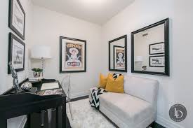 The angled area just inside bay windows is a prime location for placing a small piece of furniture, such as a desk. Staging A Den In A Condo Is An Art Find Out How We Do It