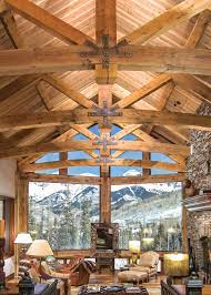 Not To Be Outdone By This Great Room S Extraordinary Rocky Mountain View The Timber Framed King Post Trusse Timber Frame Construction Great Rooms Timber Frame