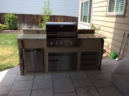 The beauty of stucco is the rainbow of colors possible, which brings in a number of. Outdoor Kitchen With Mixed Stone Veneer And Stucco Hi Tech Appliance