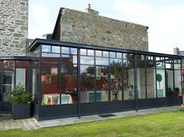 Les Verandas Pas Si Has Been Que Ca Elle Decoration Relooking Veranda Amenagement Veranda Porche Verre