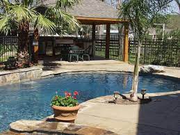 Looking for pool patio ideas? Pool Ideas Outdoor Kitchen Custom Swimming Pool Design In Houston And Katy Te Patio Backyard Pool Backyard Patio
