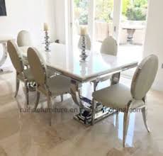 With two 15.75 open end extensions, the table can seat 8 or 10 people comfortably. China Modern 2 Meter 8 Seater Chrome Stainless Steel Base Ivory Cream Arianna Grey Solid Marble Dining Table China Dining Table Marble Dining Table