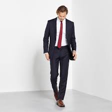 The Navy Suit A Great Choice For Almost Any Event With A Two Button Closure And Notched Lapels It Can Be Dressed Up Or Dre Bride Clothes Bride Suit Black Tux