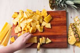 All you need is a cutting board and a sharp chef's knife. How To Cut A Pineapple The Easiest Method For Cutting A Pineapple
