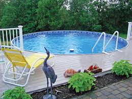 The great feature of modular design is the efficient use of available space! Radiant Round Above Ground Pool With Composite Decking Traditional Pool Detroit By Pools Spas A Go Go Houzz