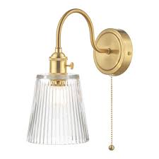 And there are a lot of options to choose from. Hadano 1lt Wall Light Brass With Clear Ribbed Glass Shade