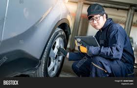 They offer a wide variety of lifts for the professional repair shop and home mechanic. Asian Auto Mechanic Image Photo Free Trial Bigstock