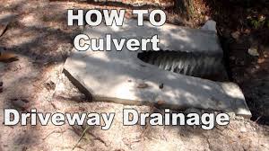 If you need to fill any dirt back in, do so in small amounts and tamp it down. How To Frame Your Form Culvert Driveway Basics Youtube