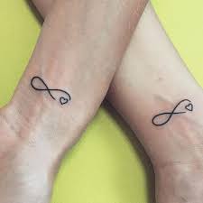 The tattoos featuring infinite symbols in various creative ways are gaining popularity due to its simplistic and meaningful presentation. Pin On Tattoos Ideen