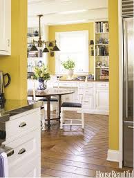 Paint your walls a deep gold shade to compliment wooden cabinetry or ceilings. 10 Yellow Kitchens That Ll Make You So Happy Homey Kitchen Yellow Kitchen Designs Retro Kitchen