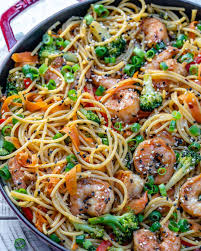 Add 1 tablespoon dressing, red bell pepper, mushrooms and green onion to skillet. Easy Shrimp Stir Fry Noodles Recipe Healthy Fitness Meals