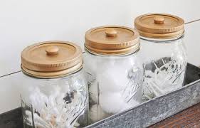 For this mason jar diy idea, paint a collection of mason jars with chalk paint and you have got yourself some gorgeous, inexpensive bathroom storage. Creative Ways To Organize With Mason Jars Mason Jar Storage Ideas