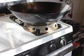 So, if you are going to use wok on gas stove use smaller burner (with low btu) of the gas stove. Vastly Improve A Wok Ring 4 Steps With Pictures Instructables