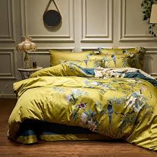 Coordinating tassels at the end corners of the duvet cover adds an elegant touch, while the solid yellow reverse complements the top of the bed. Laguna Duvet Set Egyptian Cotton Nordicted