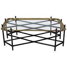 Form meets function as the lower shelf is stylishly raised to offer additional storage. Faux Bamboo And Glass And Brass Tray Coffee Table Flow Modern