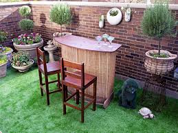 26 super cool outdoor bars for your home outdoor bar ideas diy, outdoor bar ideas, outdoor bar ideas backyards, outdoor bar ideas rustic #bar create an urban entertaining area outdoors with the camley bar table set. Small Outdoor Bar With Bamboo Facade Hgtv