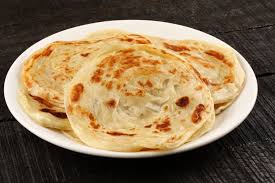 Learn How To Make Flaky Parathas For Your Indian Dishes Paratha Recipes Indian Dishes Recipes