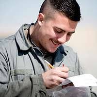 Corporal Caleb Newman shows a student from Rosebery