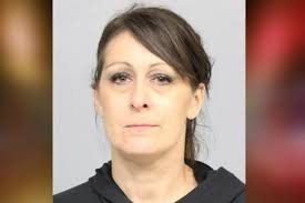 Woman headed to District Court