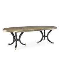 When completely opened, this table will comfortably seat ten people. Sasha Oval Silver Double Pedestal Dining Table