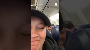 Southwest Airlines 'looking into' video of woman lying inside overhead bin  before takeoff Weekend Era