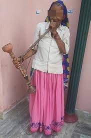 Mature woman smoking an electronic cigarette. Older Women Of Rural Haryana Holding The Hookah Smoking Flavored Download Scientific Diagram