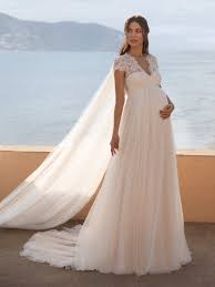 Some women prefer very simple wedding dresses, while others love some bling attached to their gowns. 35 Stunning Maternity Wedding Dresses 2021 Hitched Co Uk