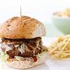Beef burger is a classic american dish, wherein juicy beef patties are stacked on soft burger buns along with lettuce, tomatoes, onions and mayonnaise. 1