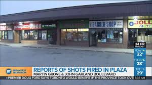 Street sign for rexdale blvd in toronto, canada. Suspect Sought After Man Killed In Drive By Shooting In Rexdale