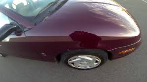 Image result for Bright Red 2001 Saturn