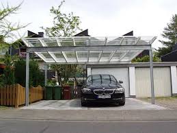 Grossfoto Glasdach Stahl Holz Doppelcarport Vor Einer Garage Carport Modern Carport Car Canopy