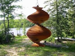 Pin By Origamiwater On Manhattan Project Wind Chimes Wind Spinners Wooden Wind Chimes