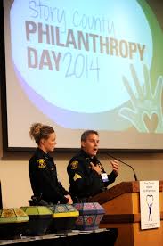 Sgt Rory Echer Right And Officer Amber Christian Of The Ames Police Department Speak After Receiving An Award On Behalf Of The Tribune Photo Philanthropy