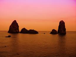 Experience the calm waters, the coastal environment and the secrets hidden in the depths of the sea. I Faraglioni Di Acitrezza Sicily Italy Sicily Photo